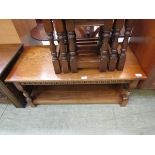 A mid-20th century oak two tier rectangular coffee table