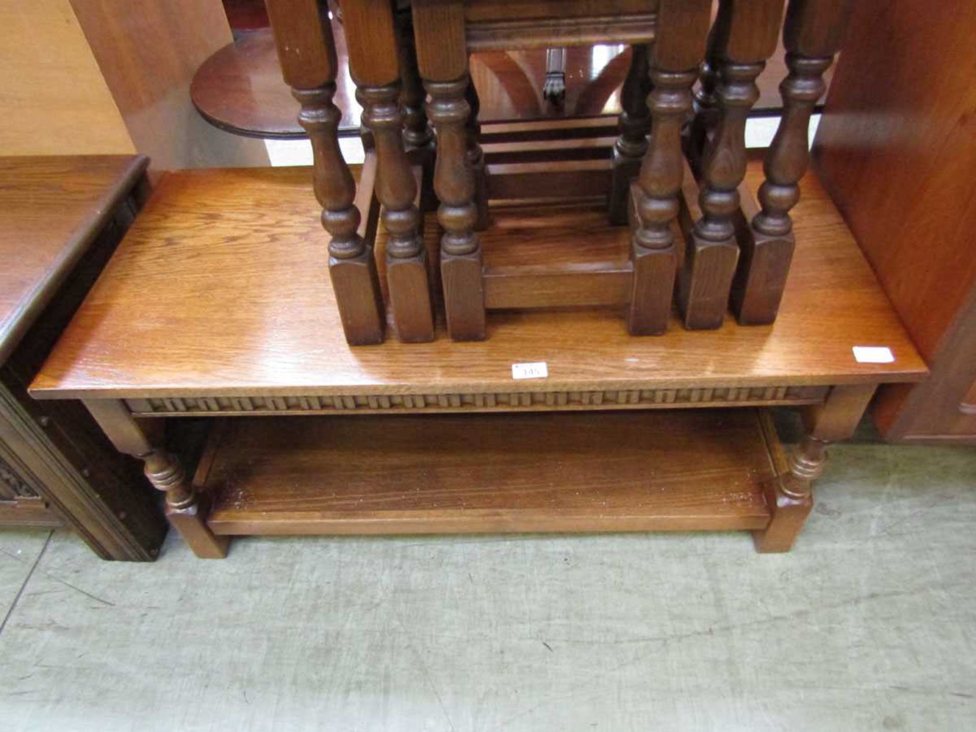 A mid-20th century oak two tier rectangular coffee table