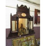 An Edwardian walnut over mantle mirror