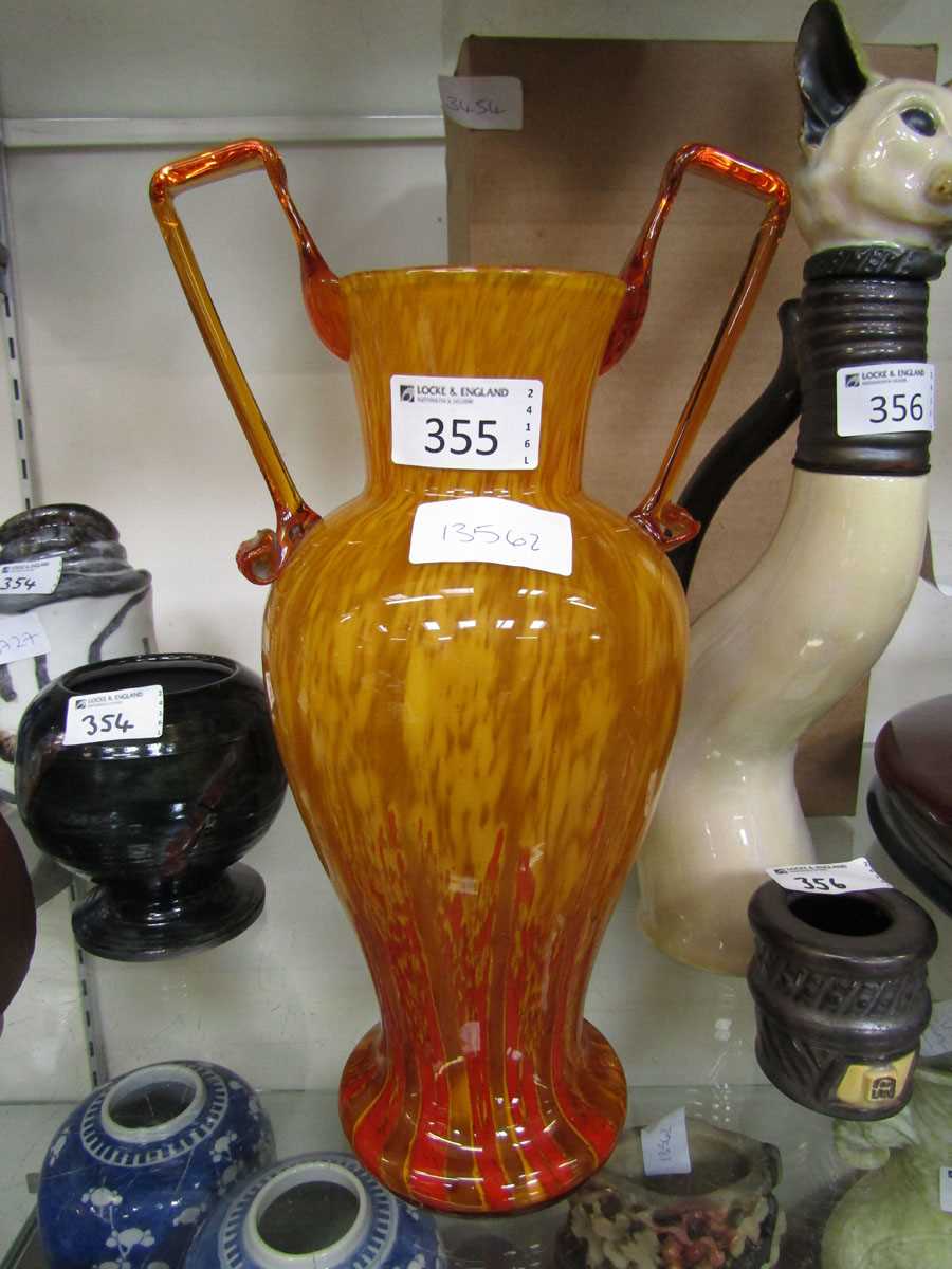 A Murano/Scheider style twin handled tango orange glass vase