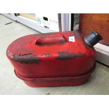 A red painted metalwork petrol can