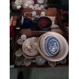 Two trays of ceramic and other ware to include plates, planters, bowls, storage jars, etc