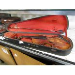 A split back violin and bow in hard carry case (A/F)