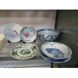 A selection of oriental style tableware to include blue and white serving bowl, blue and white