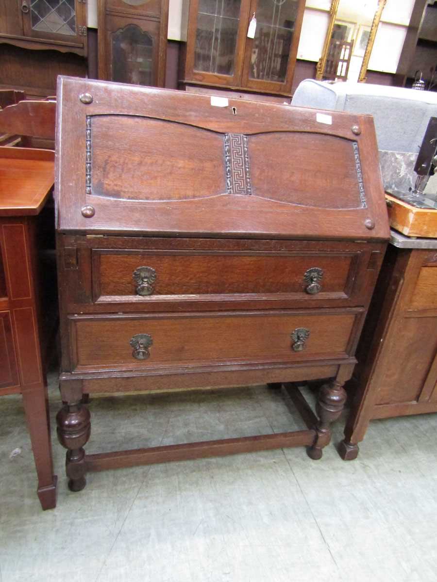 A mid-20th century oak fall front bureau