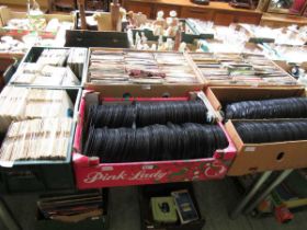 Six trays of 45RPM records by various artists to include Queen, T-Rex, Alice Cooper, Human League,