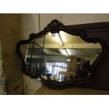 A reproduction moulded framed wall mirror