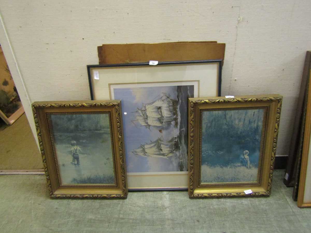 A framed and glazed print of galleons together with two gilt framed prints of children and a pair of