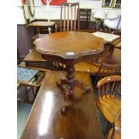 A reproduction inlaid pedestal table