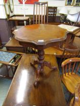 A reproduction inlaid pedestal table