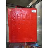 A red Shell Motor Spirit petrol can