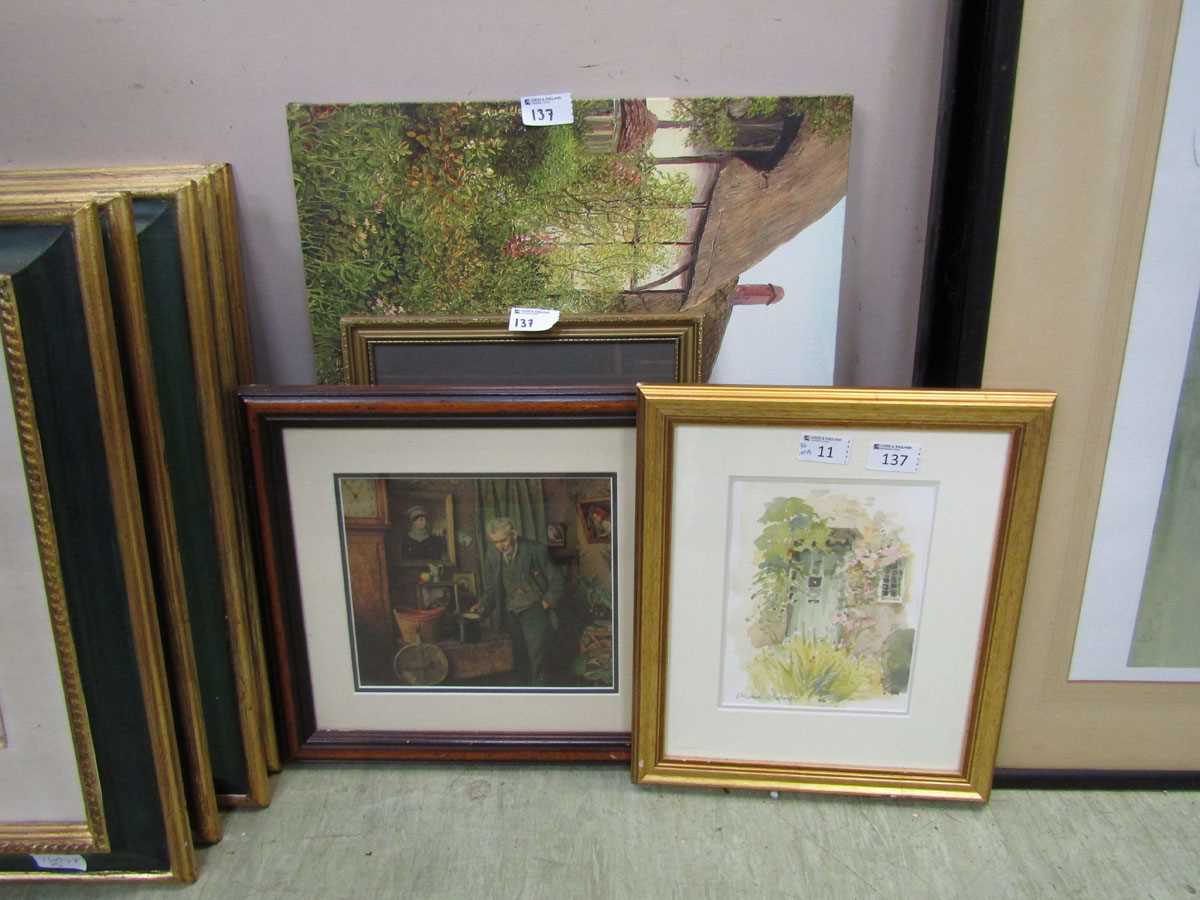 Three framed artworks of cottages, beach scenes, etc