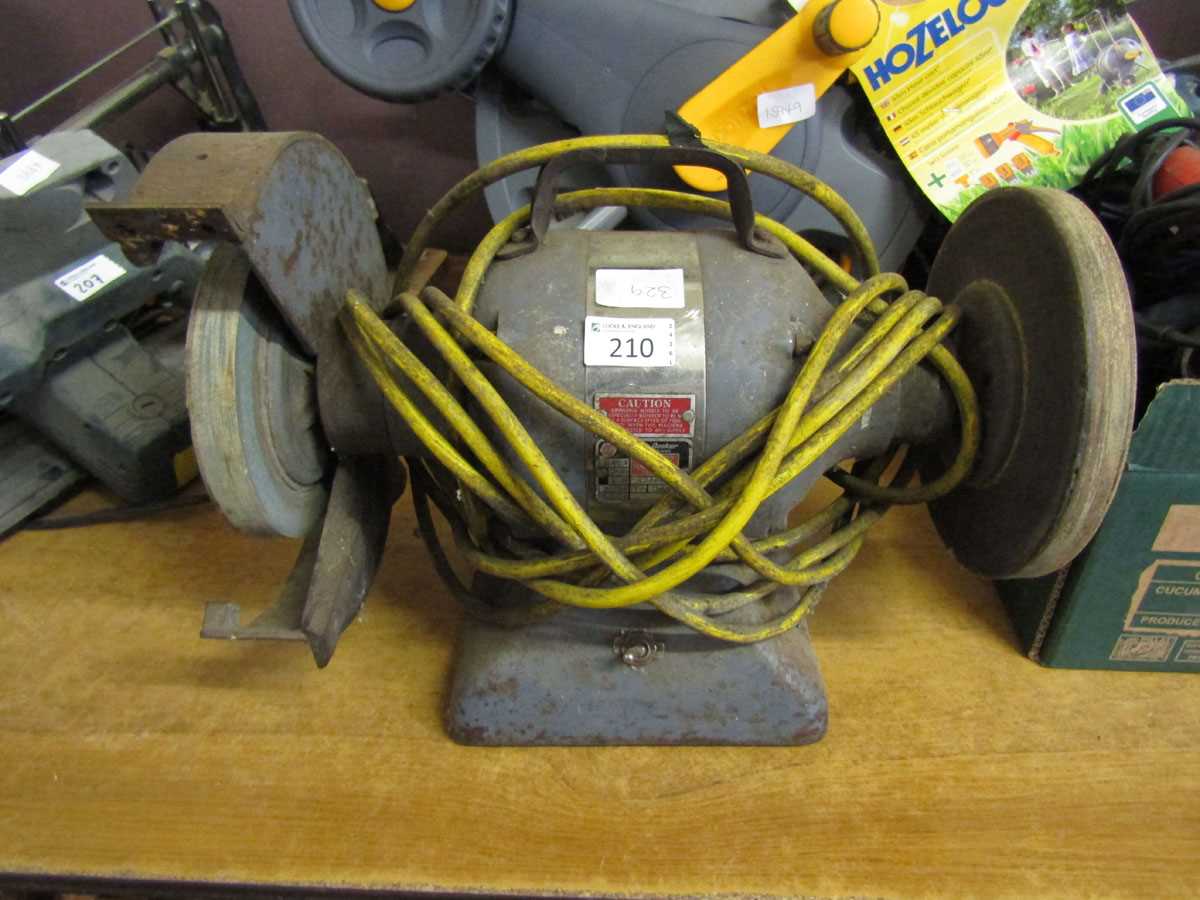 A bench top electric grinder