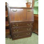 A reproduction mahogany effect G Plan fall front bureau