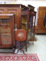 A Victorian mahogany pole screen