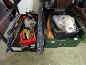Two trays containing bolt croppers, spirit level, and other decorating items