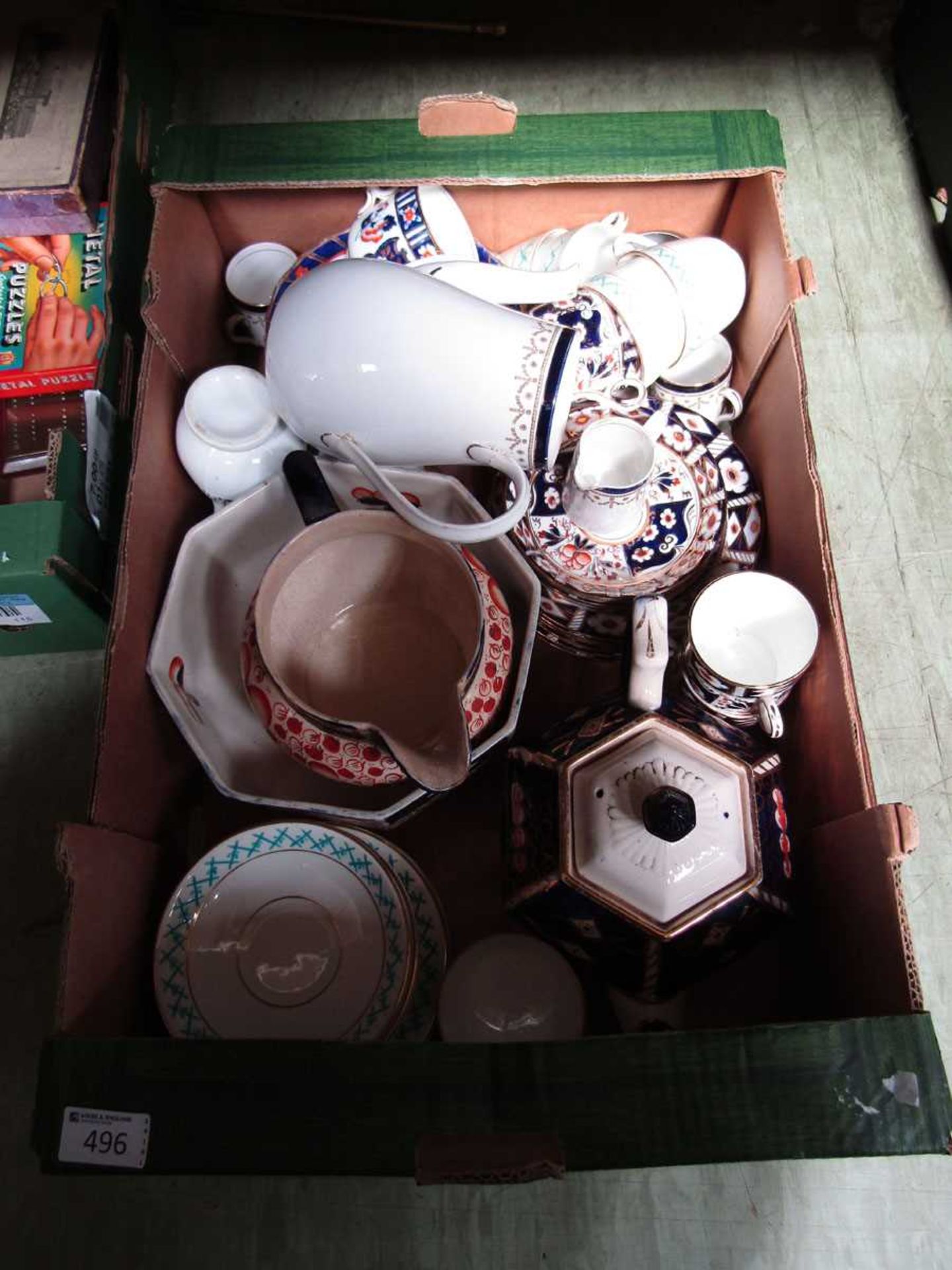 A tray of ceramic ware to include bowls, water jugs, cups, saucers, etc