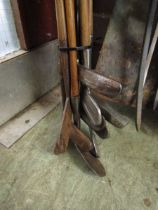 A selection of old wooden handled golf clubs