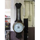 An early 20th century oak banjo aneroid barometer