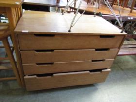 A mid-20th century oak four drawer chest