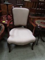 A reproduction Georgian style elbow chair