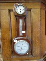 A mid-20th century mahogany banjo barometer