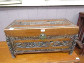 A Chinese carved caphor trunk