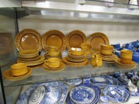 A selection of yellow embossed floral design ceramic tableware by Royal Worcester to include plates,