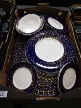 A tray containing blue and white ceramic Royal Worcester 'Monte Carlo' tableware