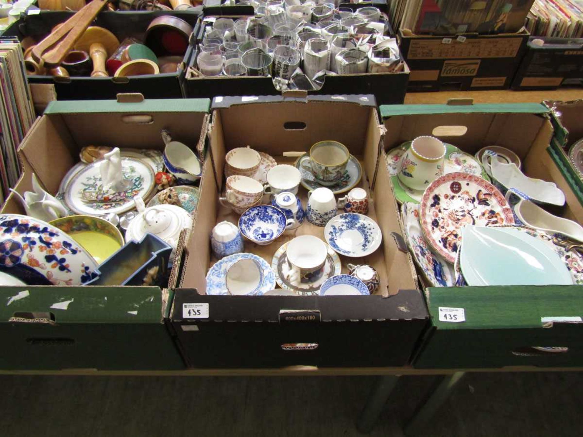 Three trays of ceramic ware to include bowls, cups, saucers, plates, Poole Pottery vase, etc
