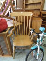A modern lathe back elbow Windsor chair