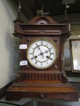 A 20th century mahogany cased mantel clock by Junghans (A/F) with brass flags to top