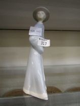 A Valencia ceramic figurine of oriental lady
