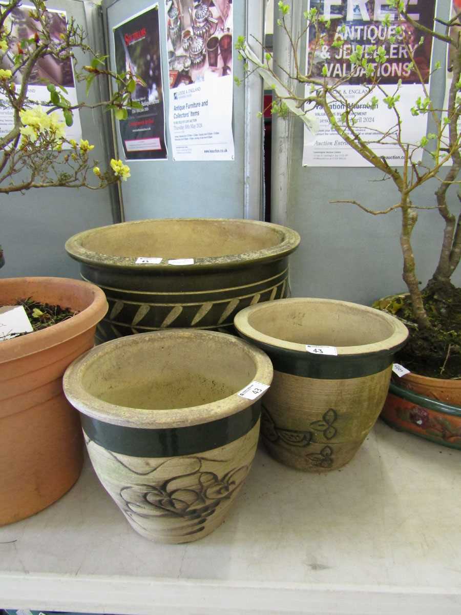 Three glazed garden pots