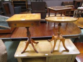 A reproduction yew pedestal hall table together with a yew oval topped pedestal table (A/F)