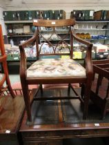 A reproduction Georgian style mahogany inlaid open armchair