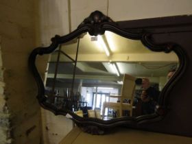 A reproduction moulded framed wall mirror