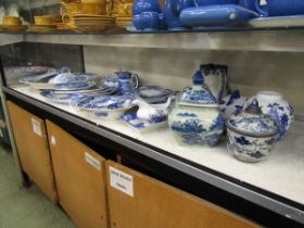 A large assortment of oriental style blue and white ceramic tableware to include meat plates,