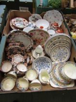 Two trays of ceramic ware to include Japanese style part tea set, cups, saucers, etc