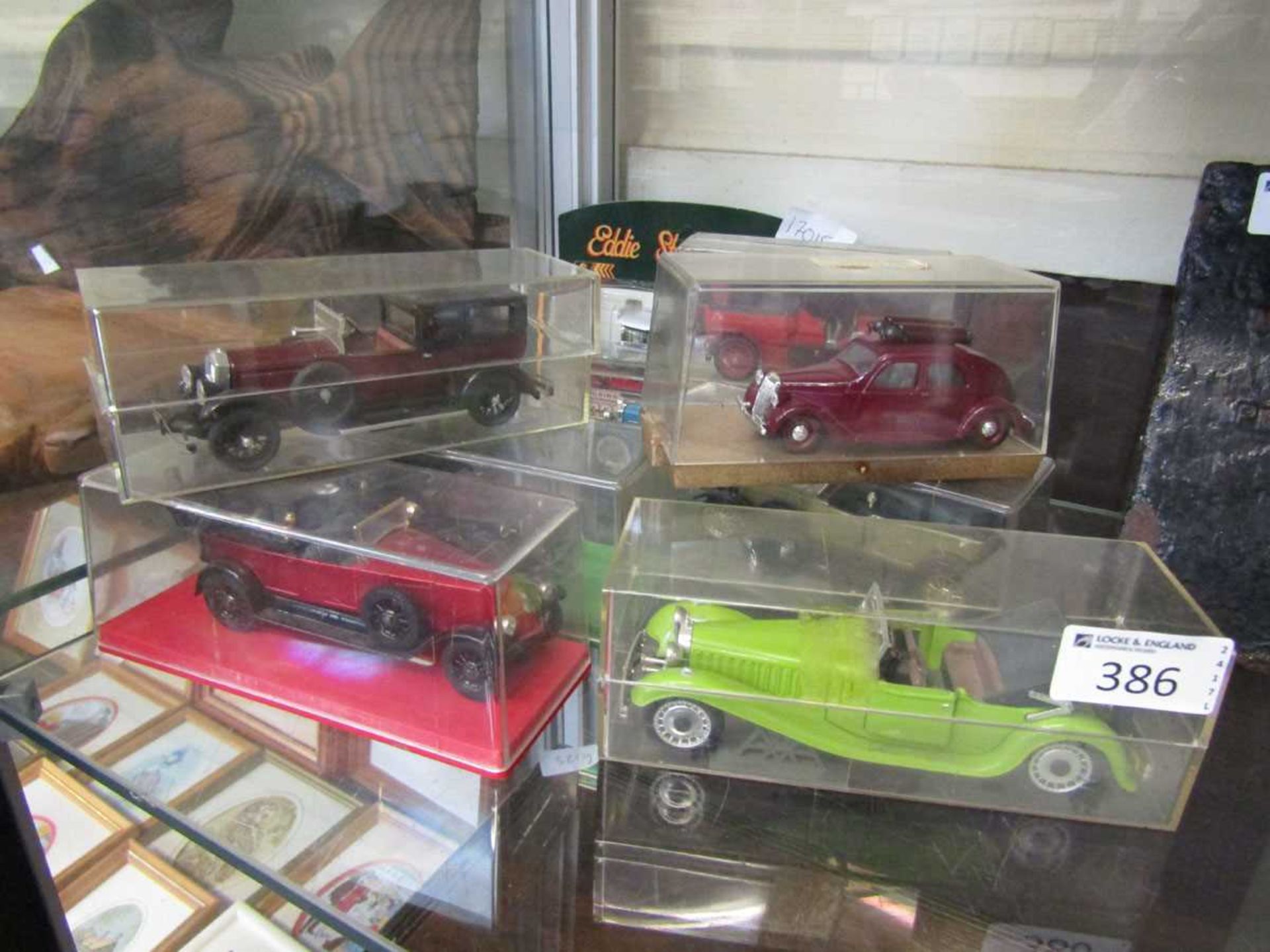 A collection of die cast cars and trucks