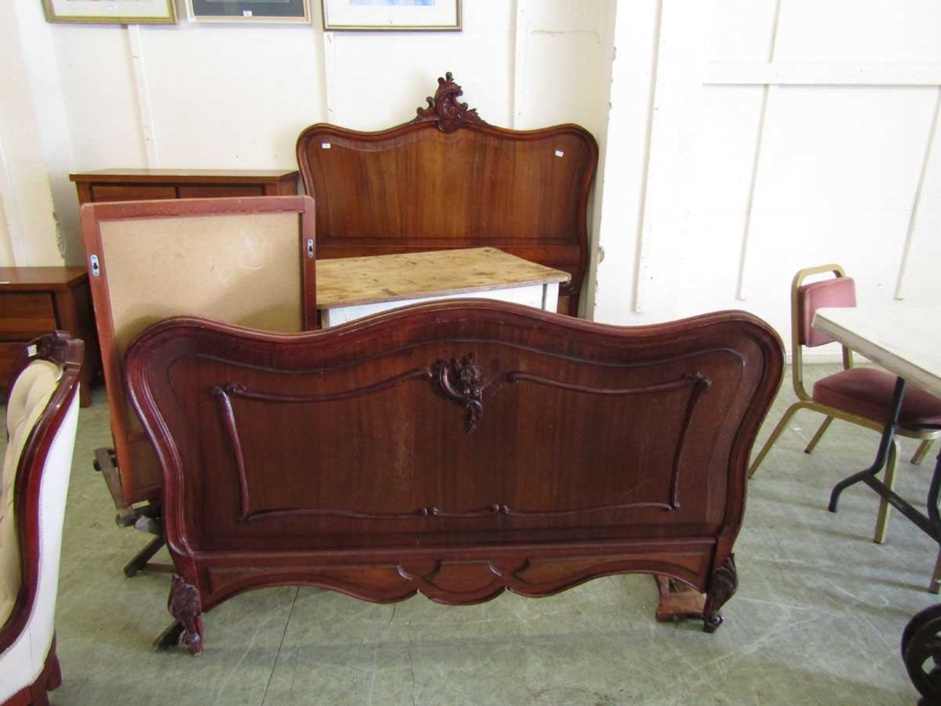 A French walnut bedstead