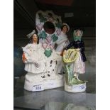 A Staffordshire flat back figural group of lady and gent along with one other Staffordshire figurine