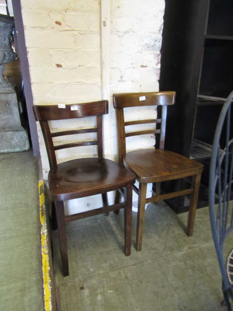 Two mid-20th century rail back chairs