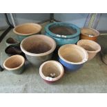 A selection of ten glazed garden pots