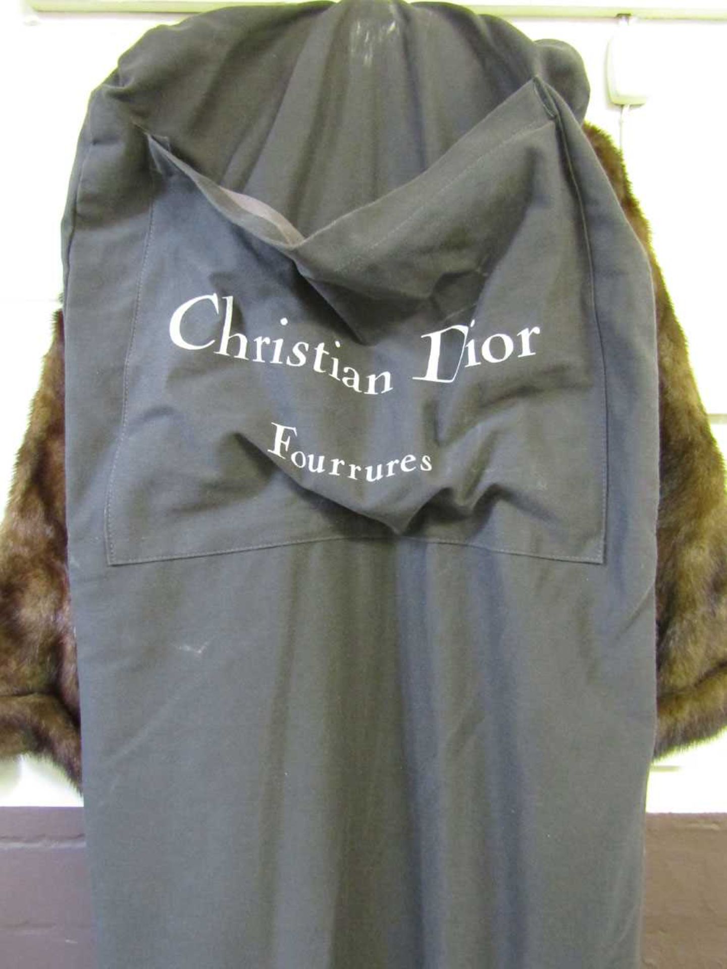 A brown fur coat by Claude Alexandre of Paris along with a Christian Dior furrier's bag - Image 3 of 3
