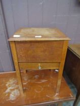 A mid-20th century oak sewing box with contents