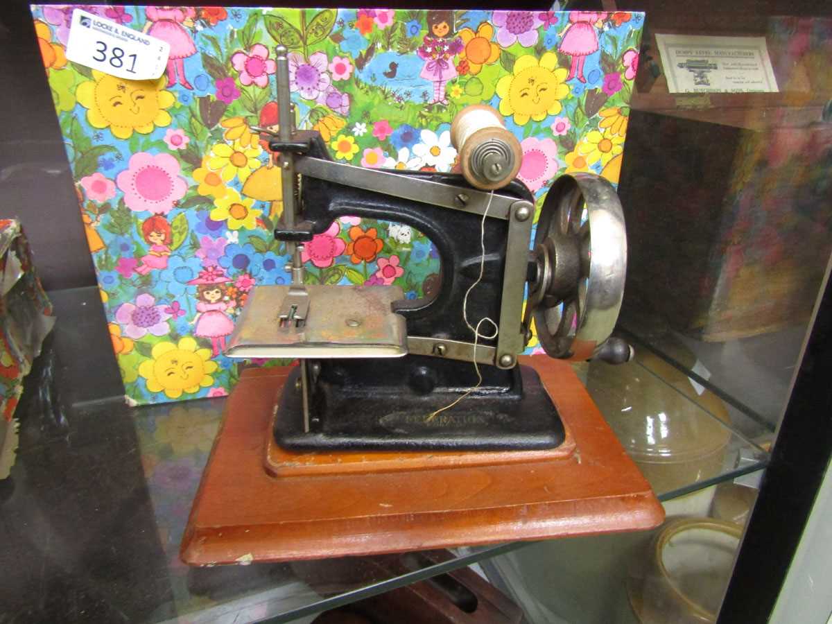 An early 20th century Federation cast metal children's sewing machine