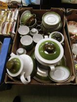 A tray containing a mid-20th century design green and brown studio pottery tableware to include