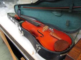 A Stentor Student violin with bow in Skylark Brand hard carry case