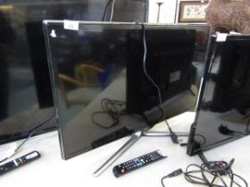 A 32in. Samsung flat screen TV with remote, model no. UE32ES6540U